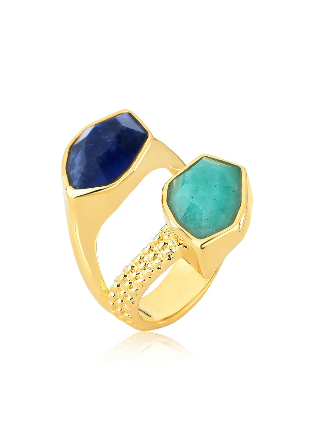 Gold ring with blue and green gemstones on a white background