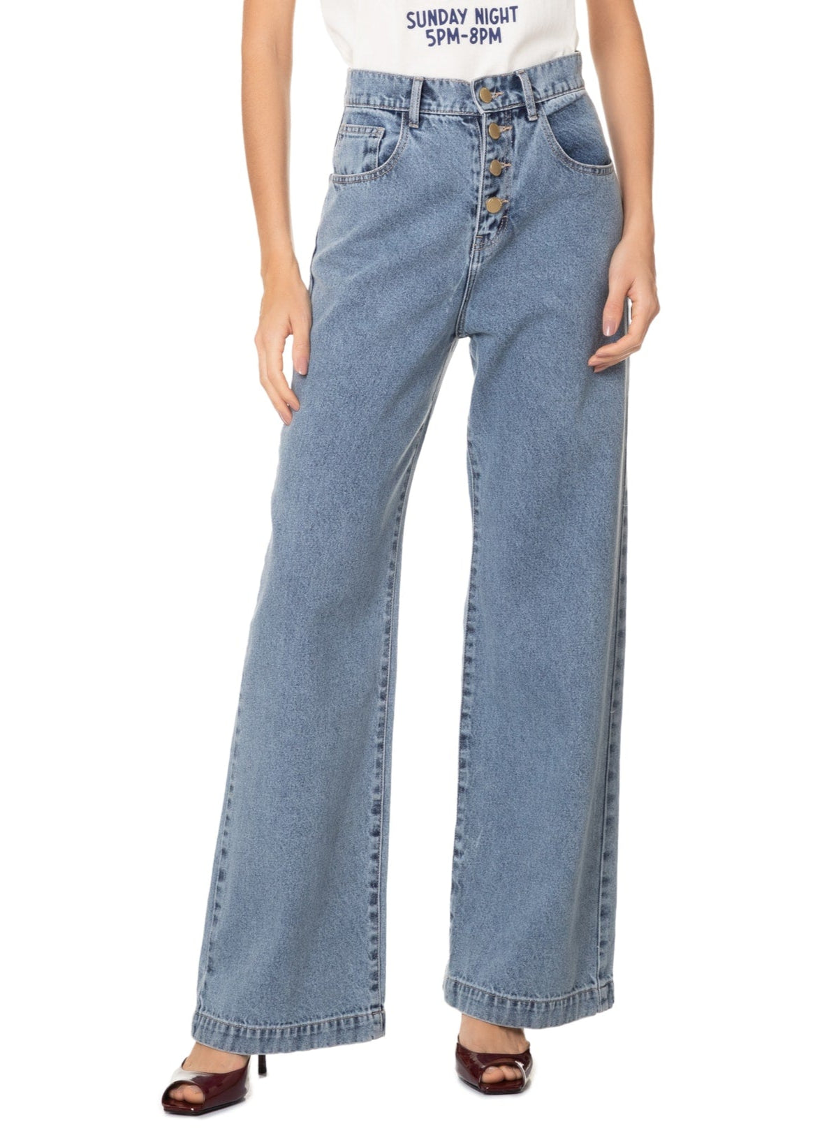 Light blue wide-leg jeans worn by a person on a white background