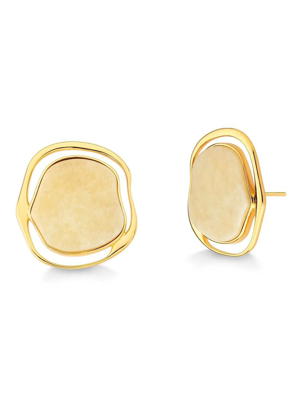 Pair of gold earrings on a white background