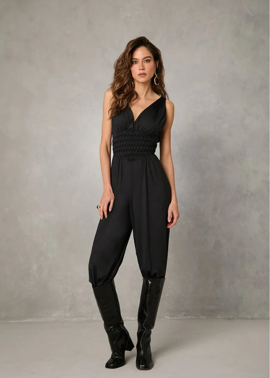 Woman wearing a black jumpsuit