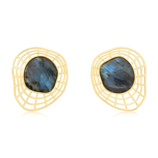 A pair of gold-toned statement earrings featuring organic-shaped labradorite stones with blue and gray flashes, set in a geometric openwork frame.