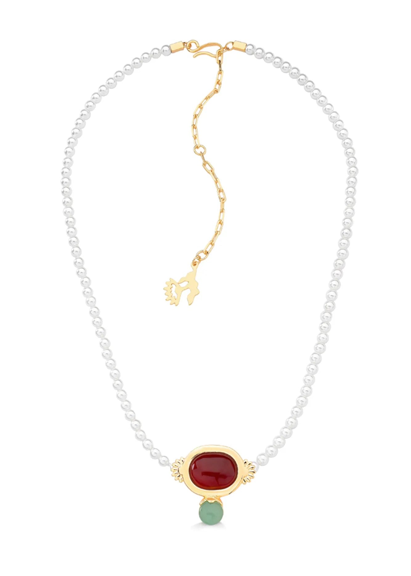 Necklace with a gold clasp and red gemstone on a white background