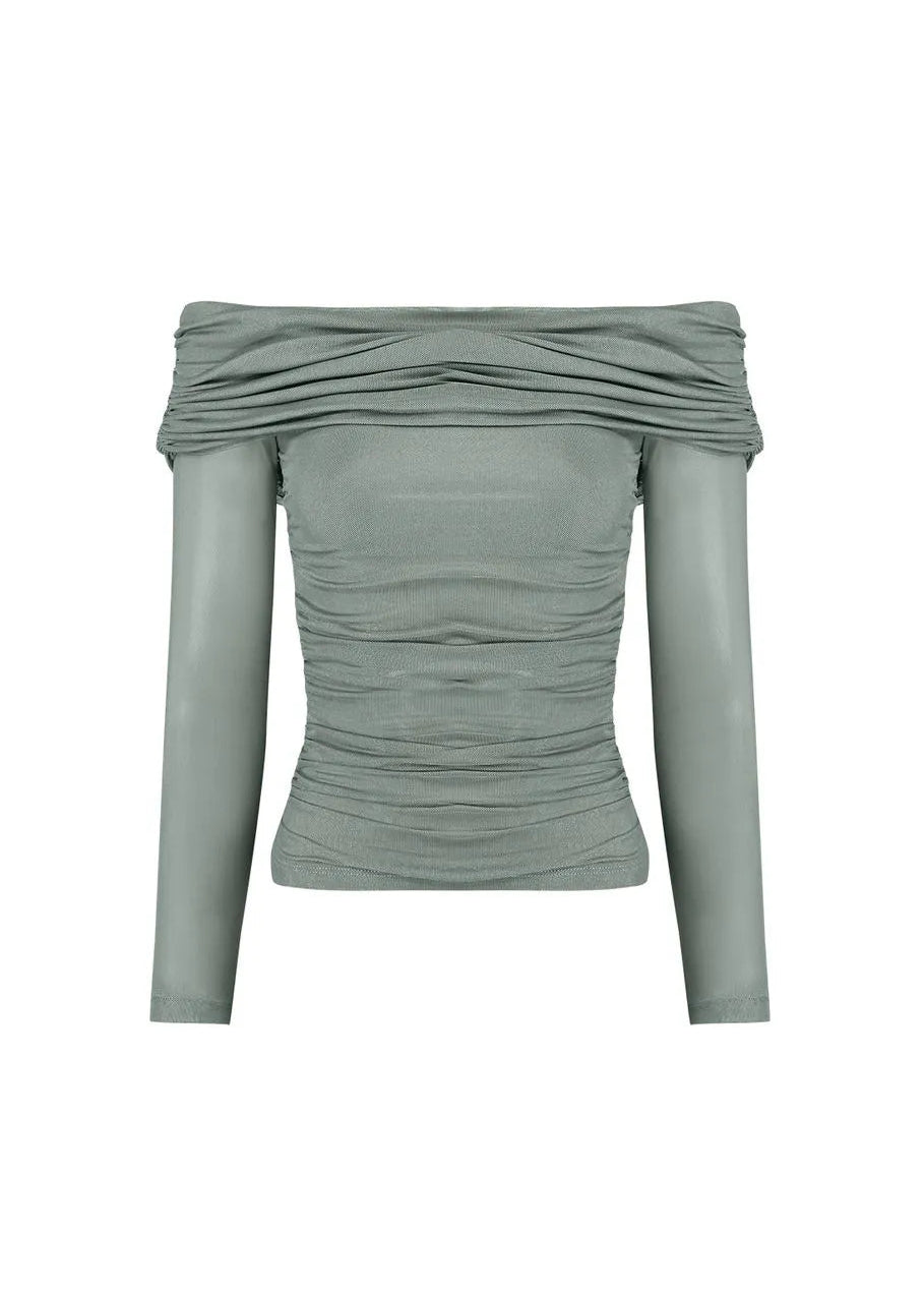 Green off-shoulder top on a white background
