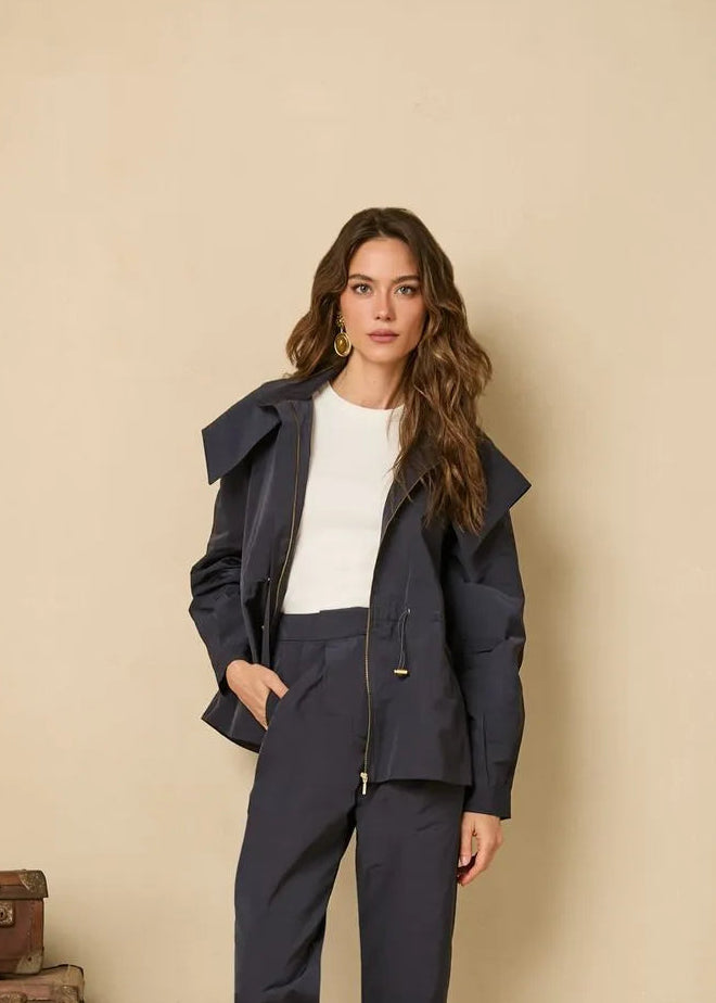 Woman in a navy blue jacket