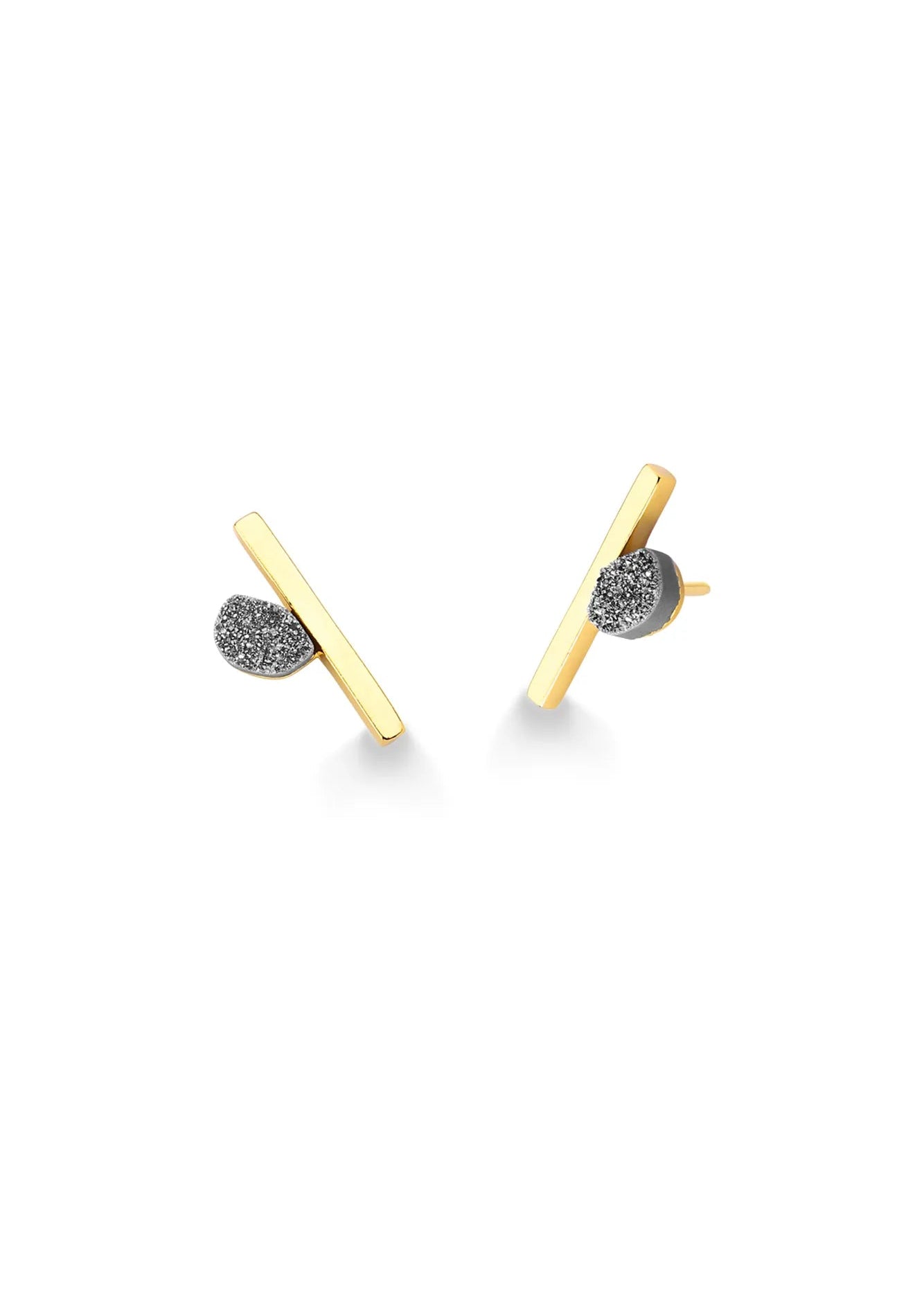 A pair of gold bar stud earrings with a textured, dark gray circular accent on each earring, shown on a clean white background.