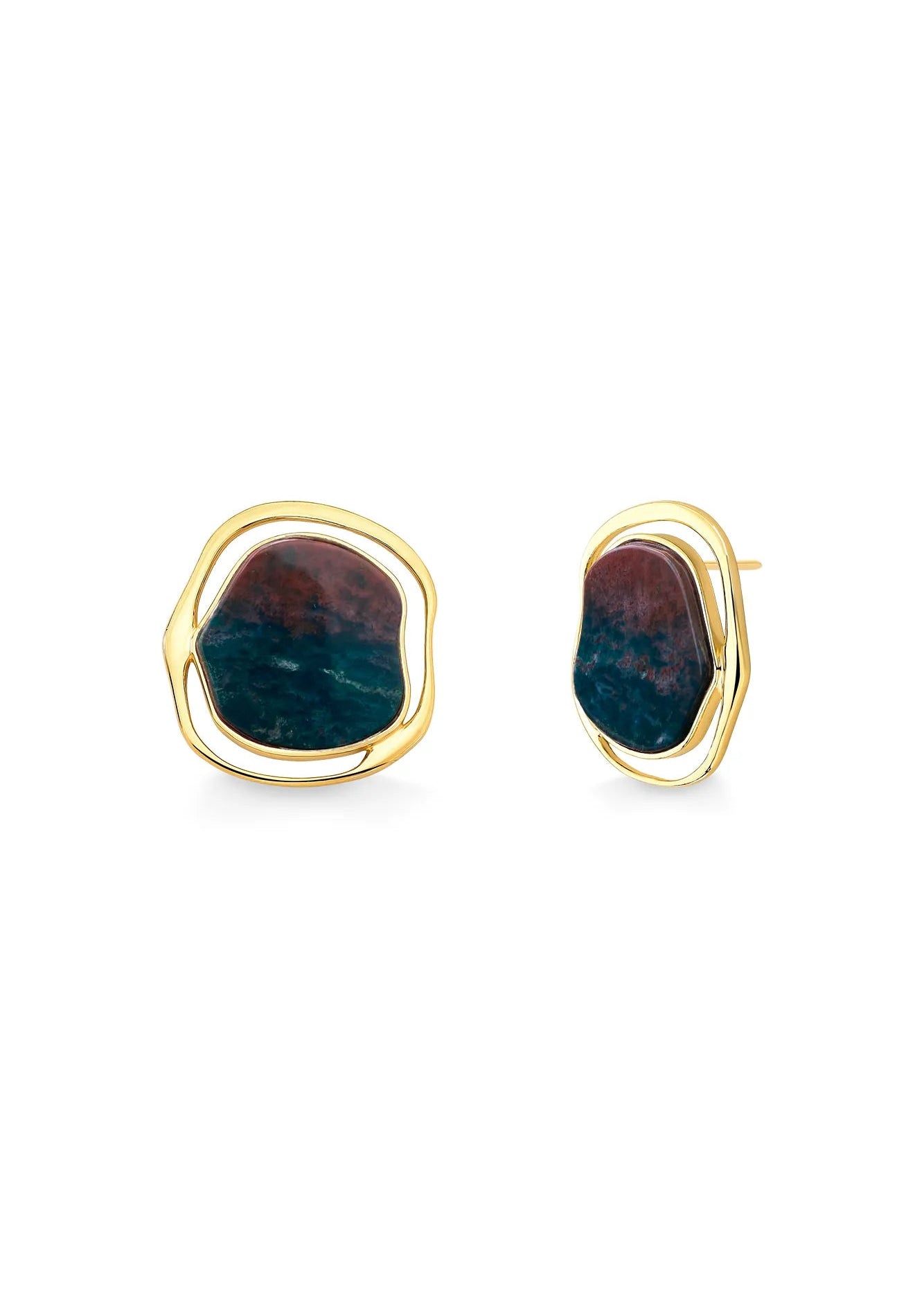 Set of four golden earrings with different designs on a white background