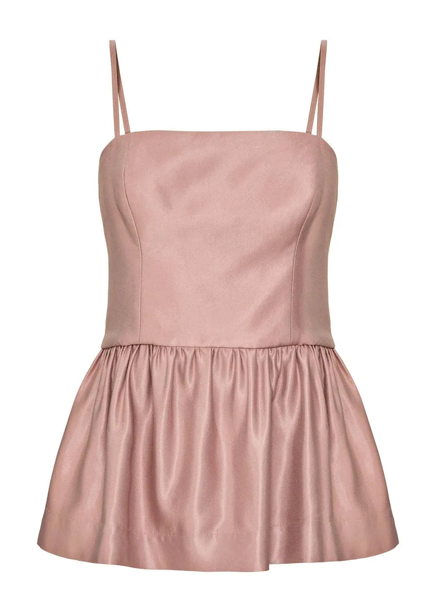 Pink dress with thin straps on a white background