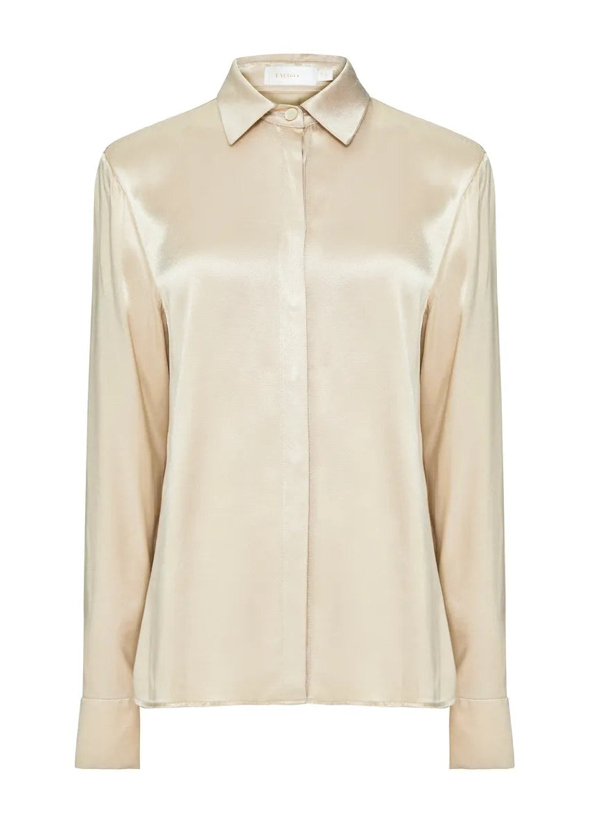 Beige satin shirt on a white background