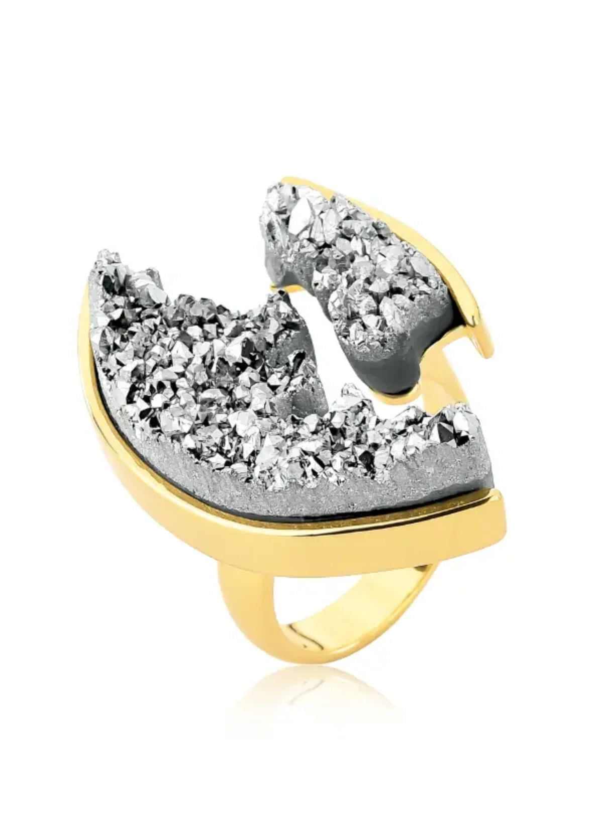 Gold and silver ring with textured design on a white background
