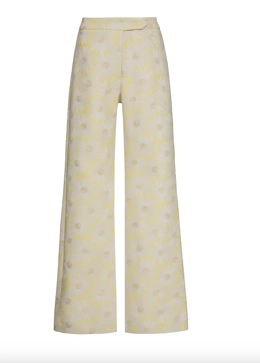 Wide-leg pants with a subtle pattern on a white background