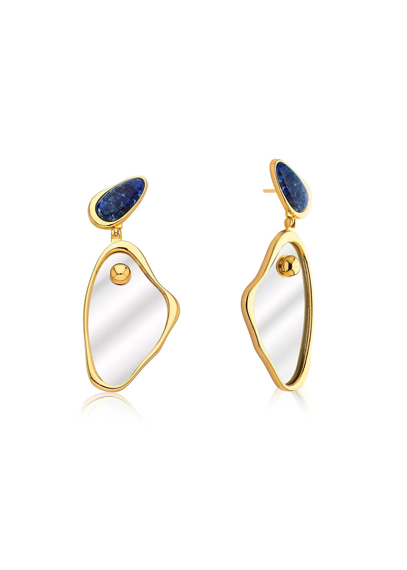 Gold and white earrings with blue stones on a white background