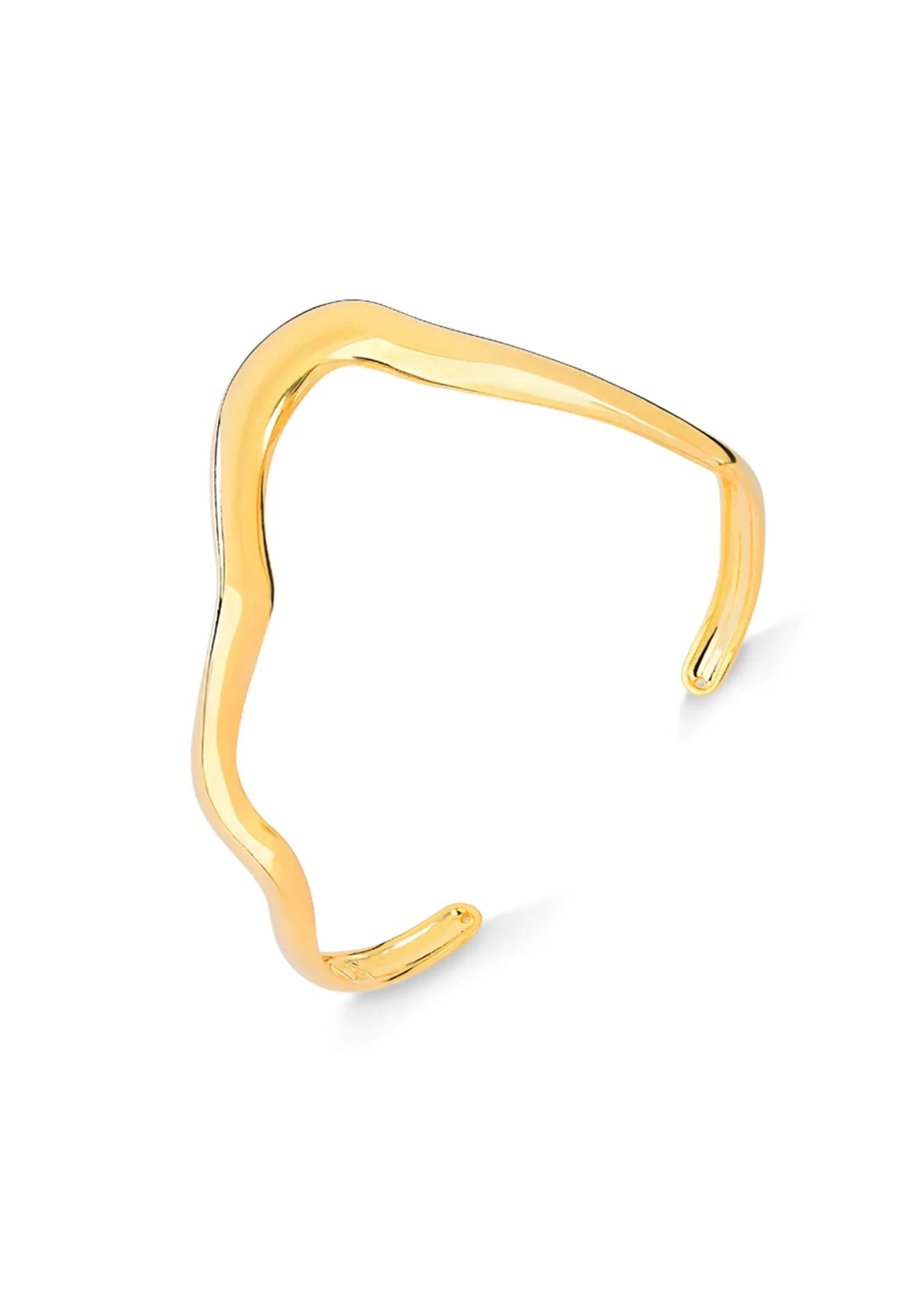 A polished gold open cuff bracelet with an organic, wavy silhouette, photographed on a clean white background.