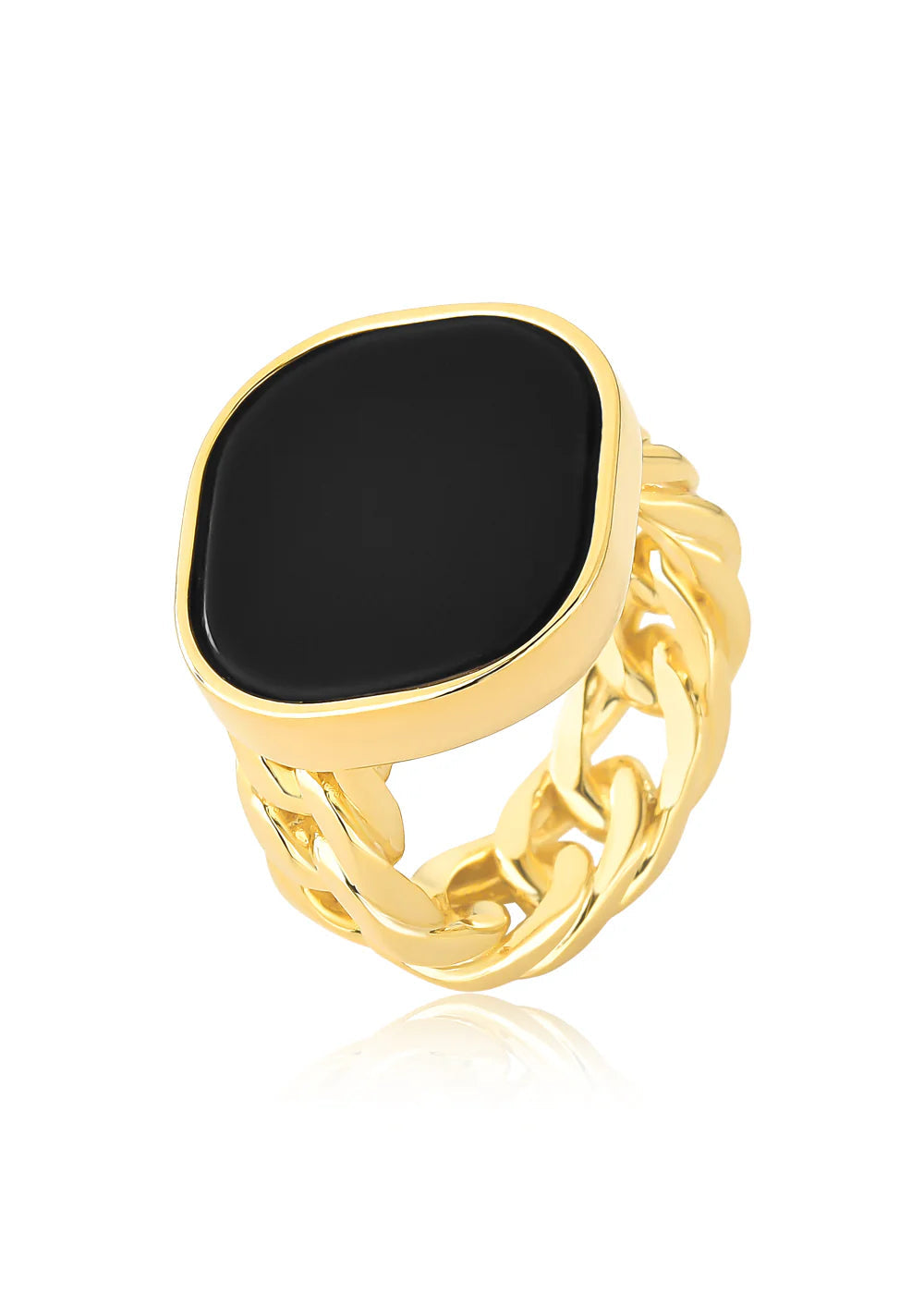 Gold ring with a black stone on a white background