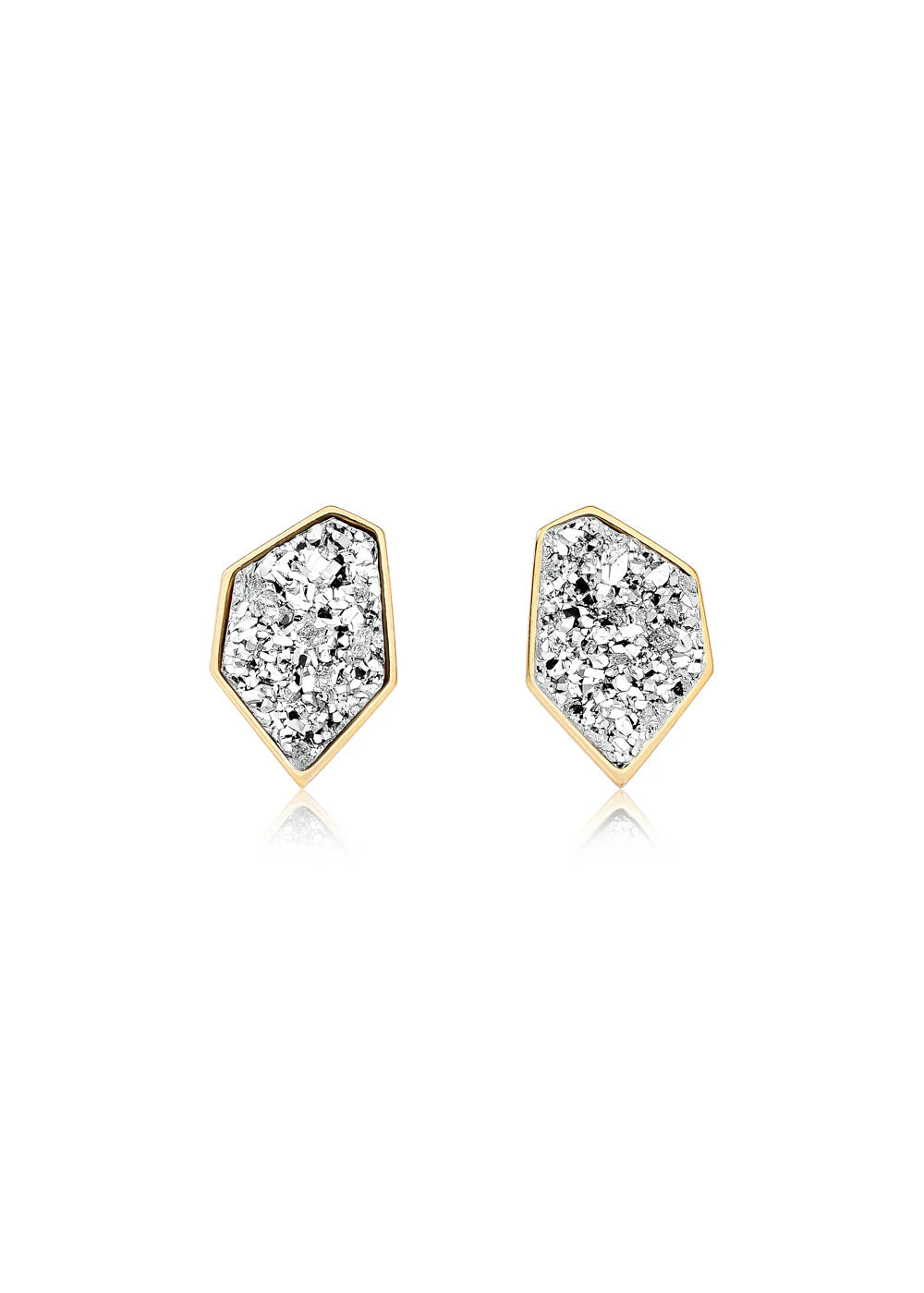 Gold and diamond earrings on a white background
