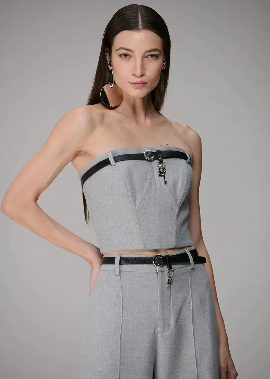 grey colored corselet with leather details