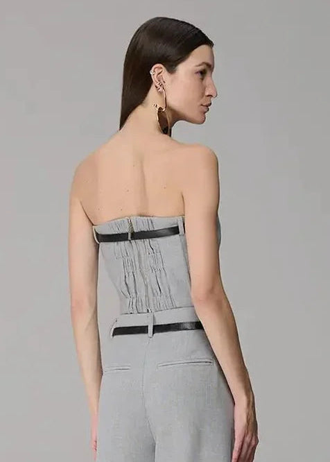 grey colored corselet with leather details