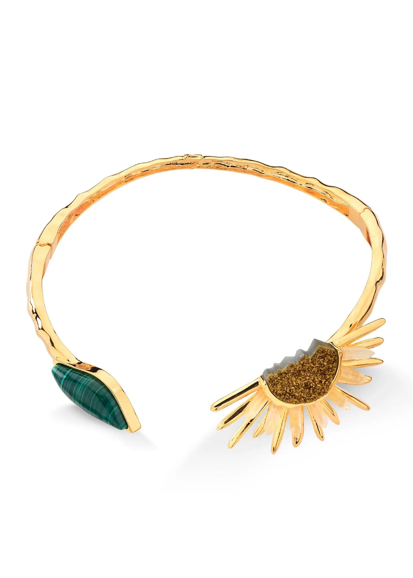 A gold-toned open cuff bangle choker featuring a textured hammered band, a gold sunburst motif on one end, and a green malachite stone on the other, shown on a white background.