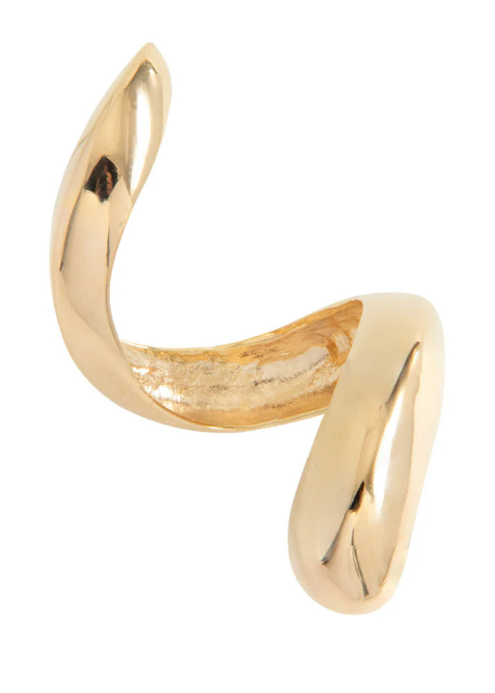 Gold open cuff bracelet on a white background