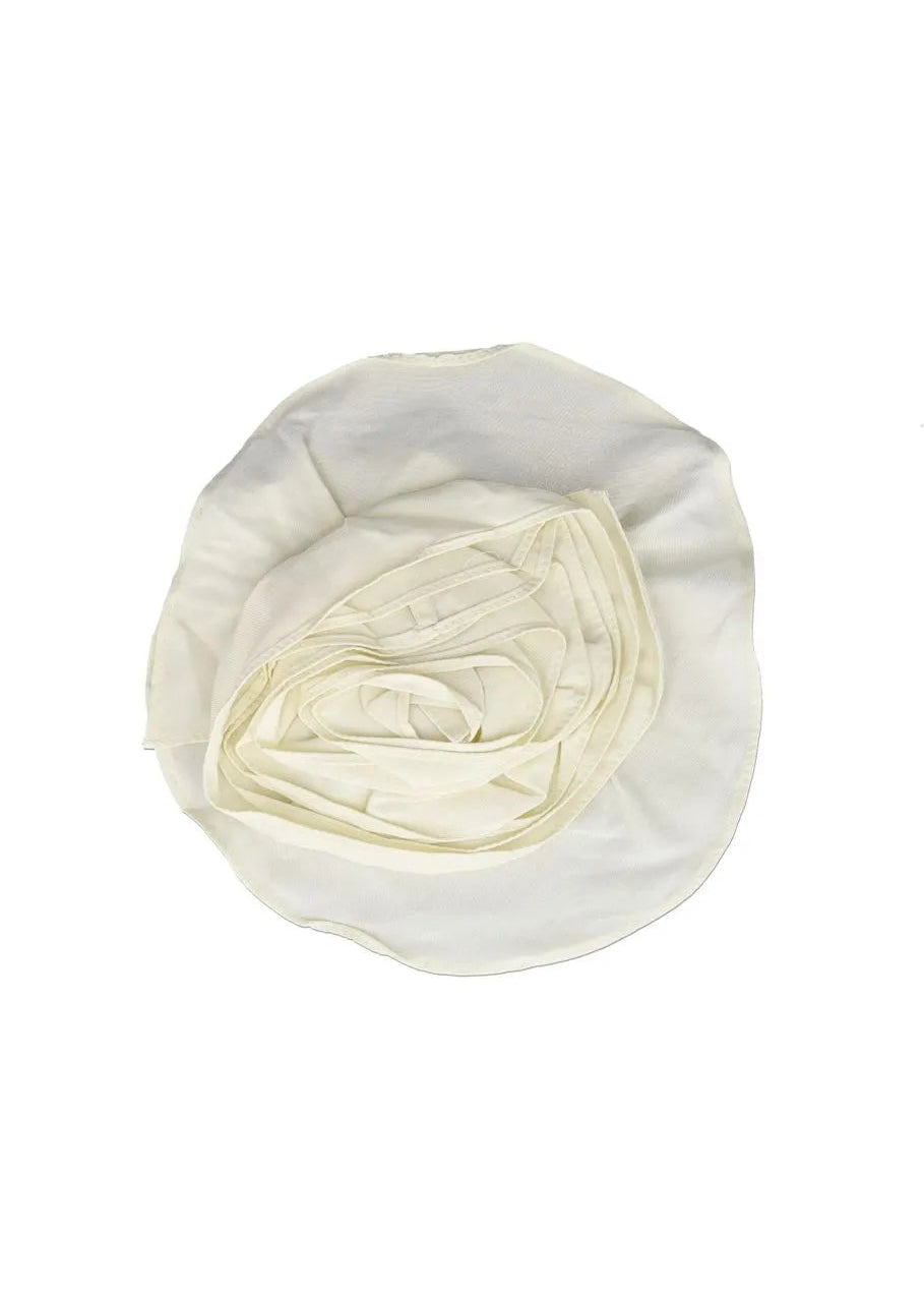 White satin hair bonnet on a white background