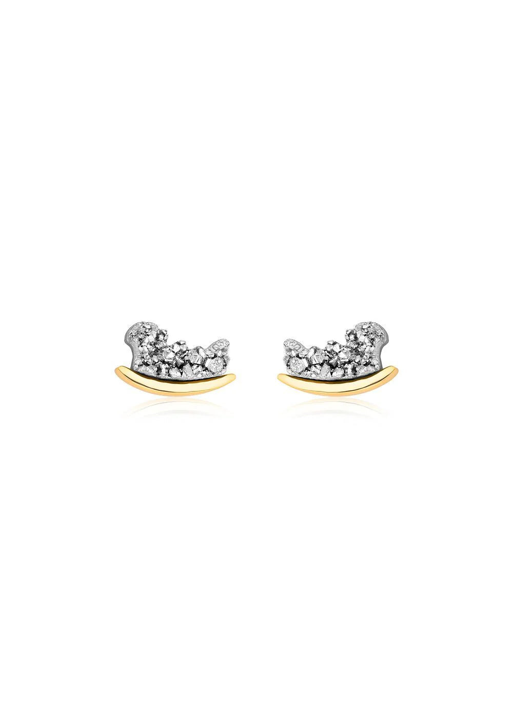 Pair of gold and silver earrings on a white background