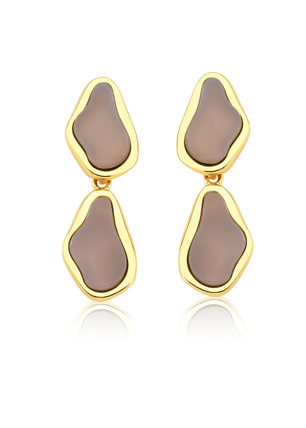 Gold earrings with brown stones on a white background