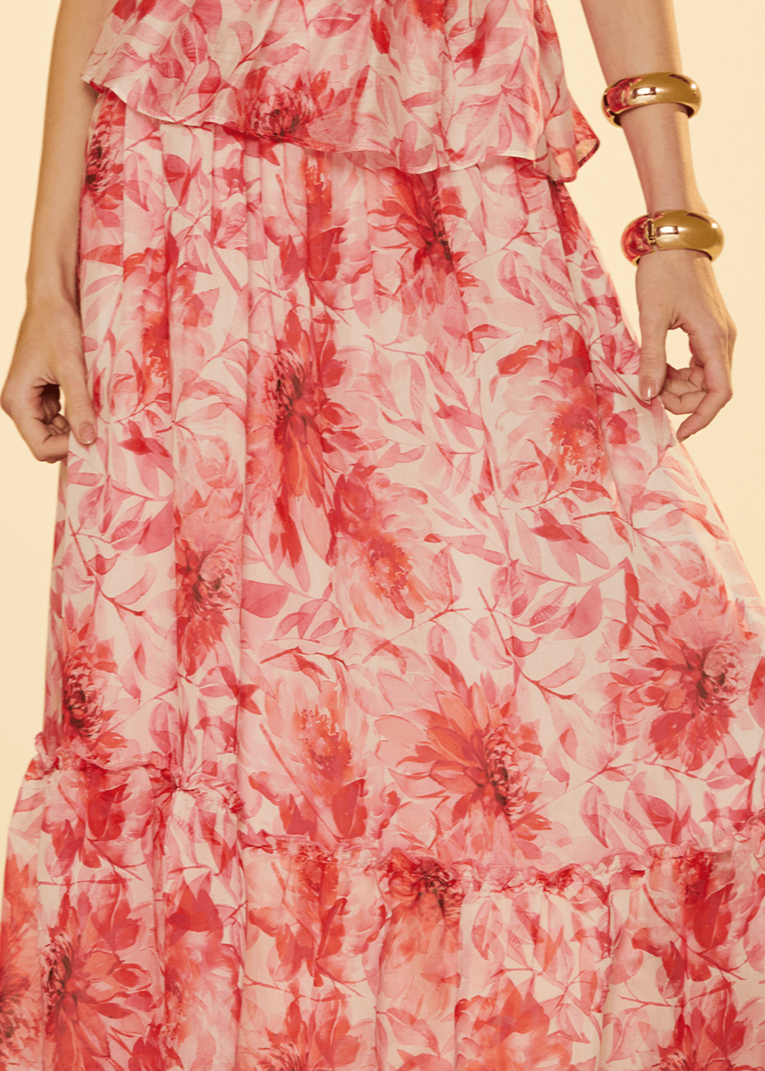 Red floral dress on a beige background