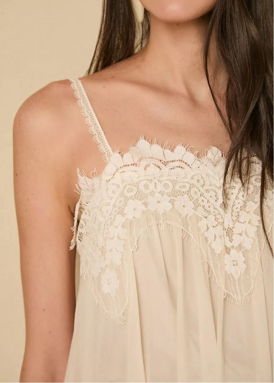 Beige lace dress worn by woman