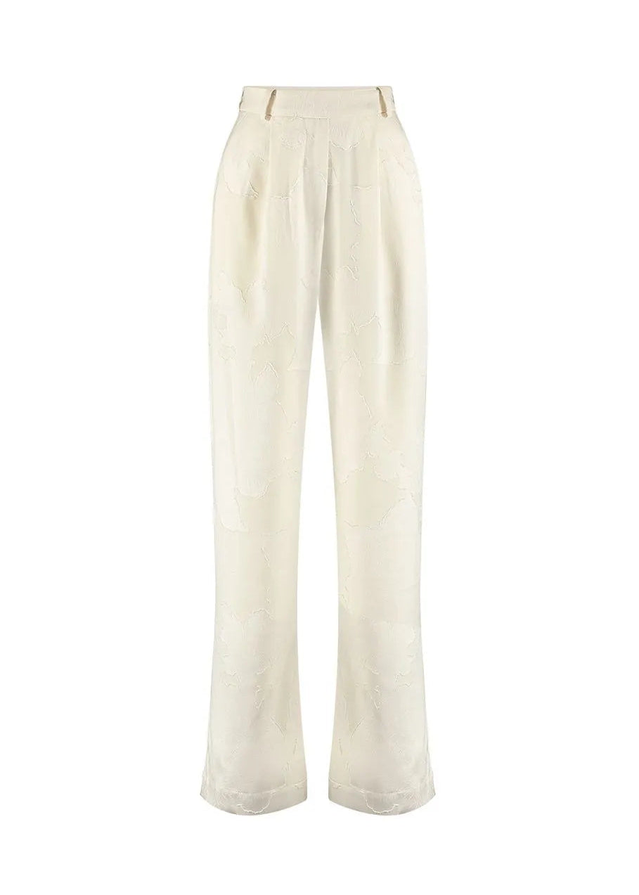 White floral pants on a white background