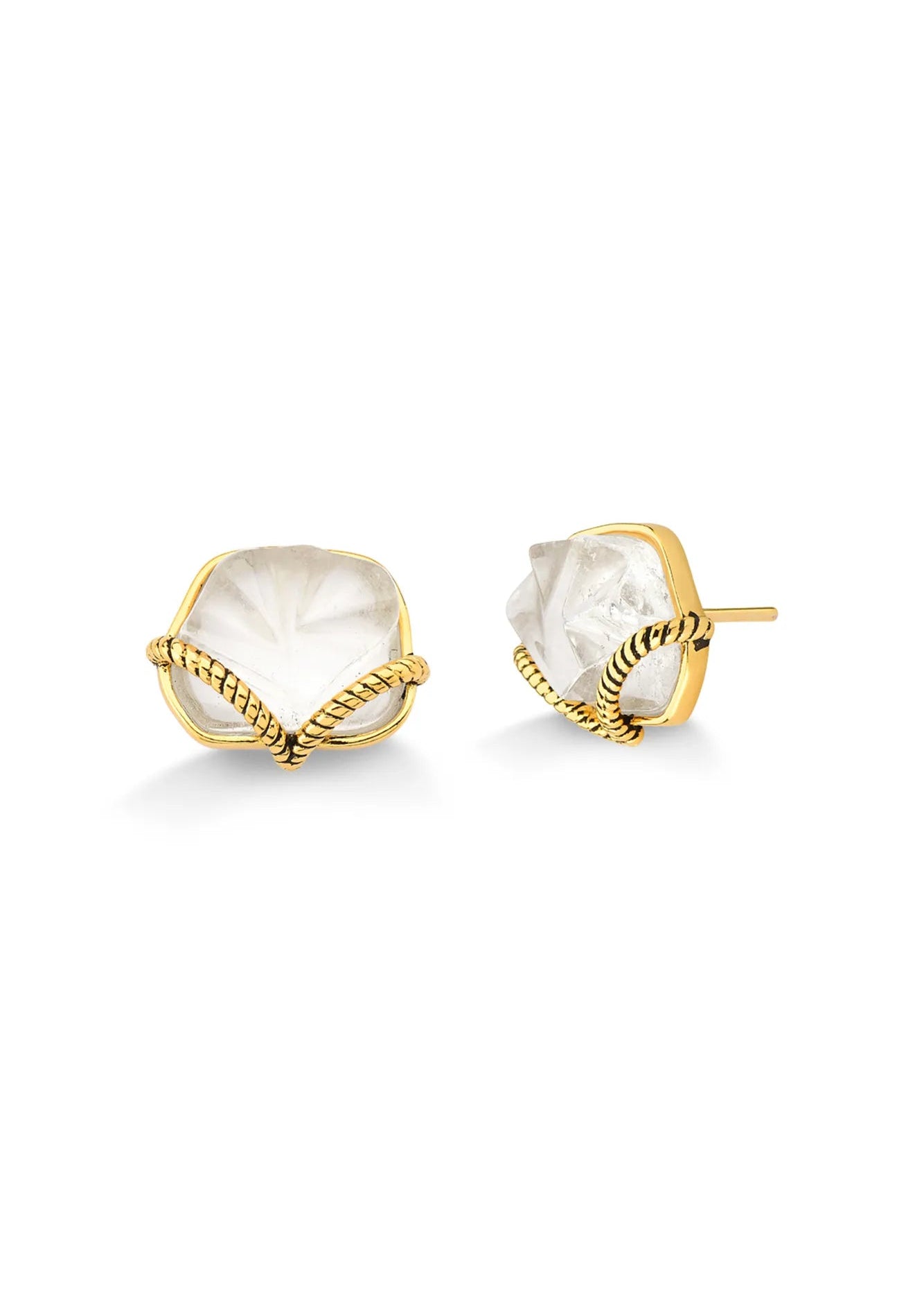 Gold earrings with white stones on a white background