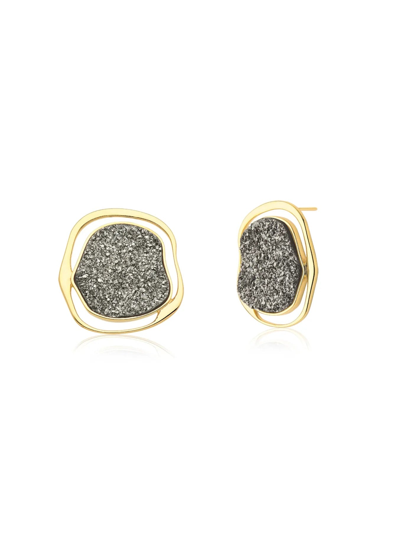 Pair of gold-framed earrings with gray stone centers on a white background