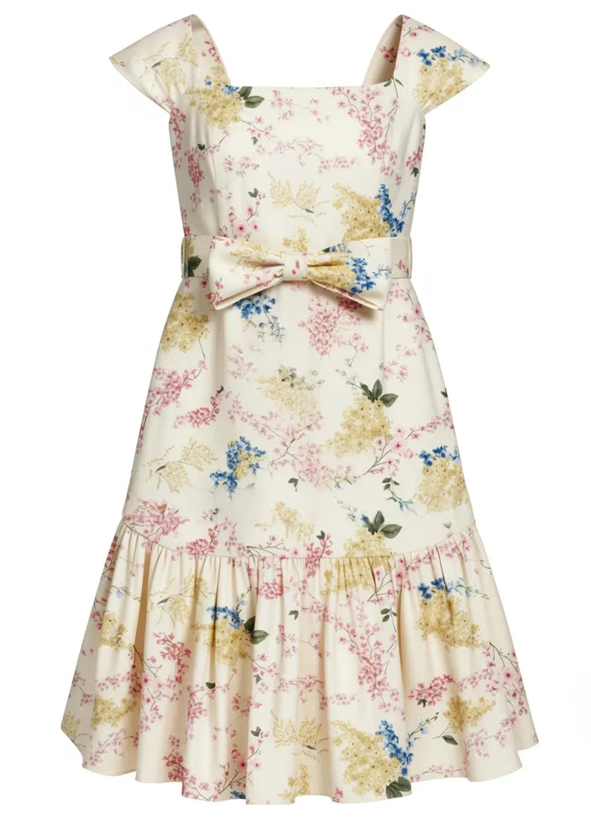 Floral dress with a bow detail on a white background
