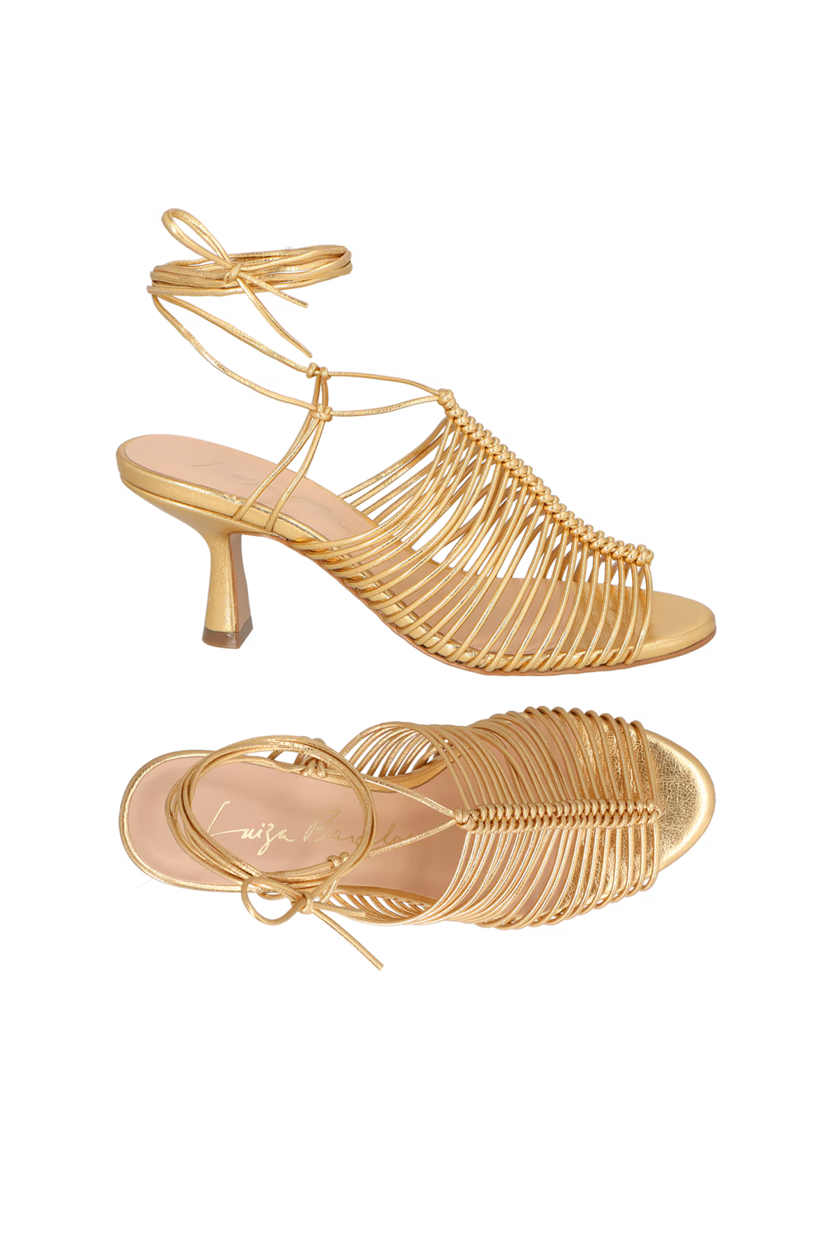 Gold high-heeled sandals with a brand name on a white background