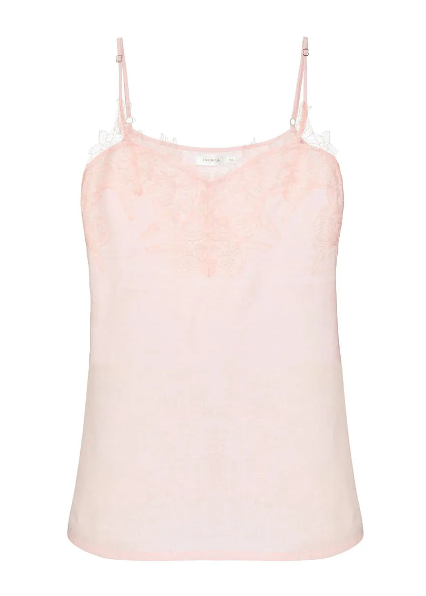 Light pink linen top on a white background
