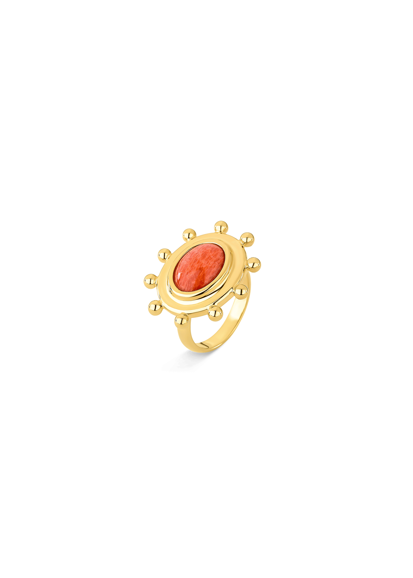 Gold ring with a red stone on a white background