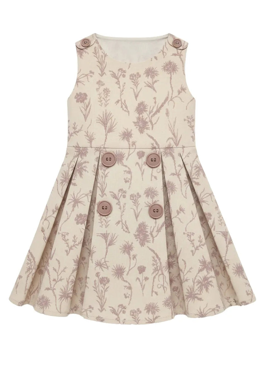 Children's dress with floral pattern and buttons on a white background
