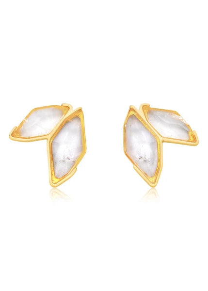 A pair of gold geometric stud earrings with white marbled inlay stones, displayed on a clean white background with a subtle reflection.