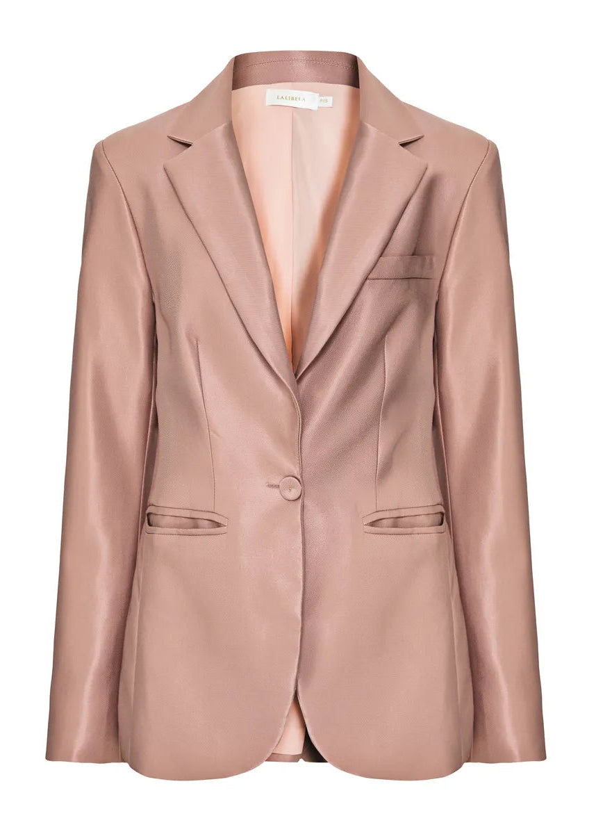 Pink blazer on a white background