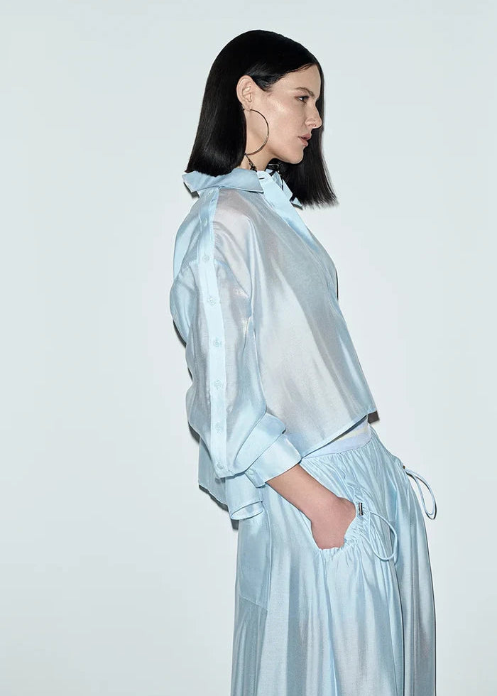 Shirt with buttoned sleeves