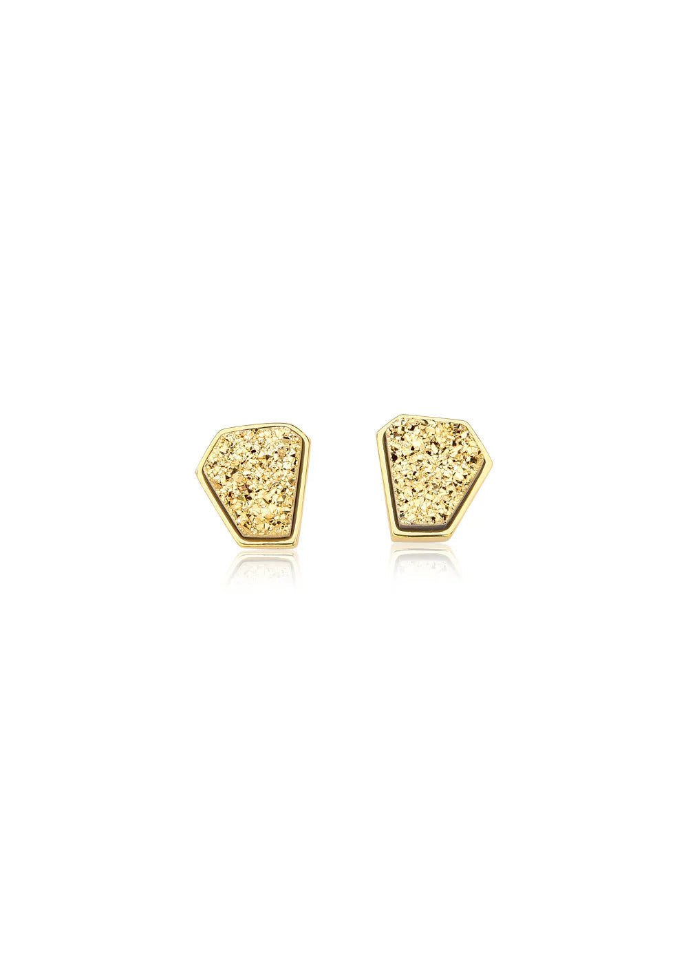 Gold stud earrings on a white background