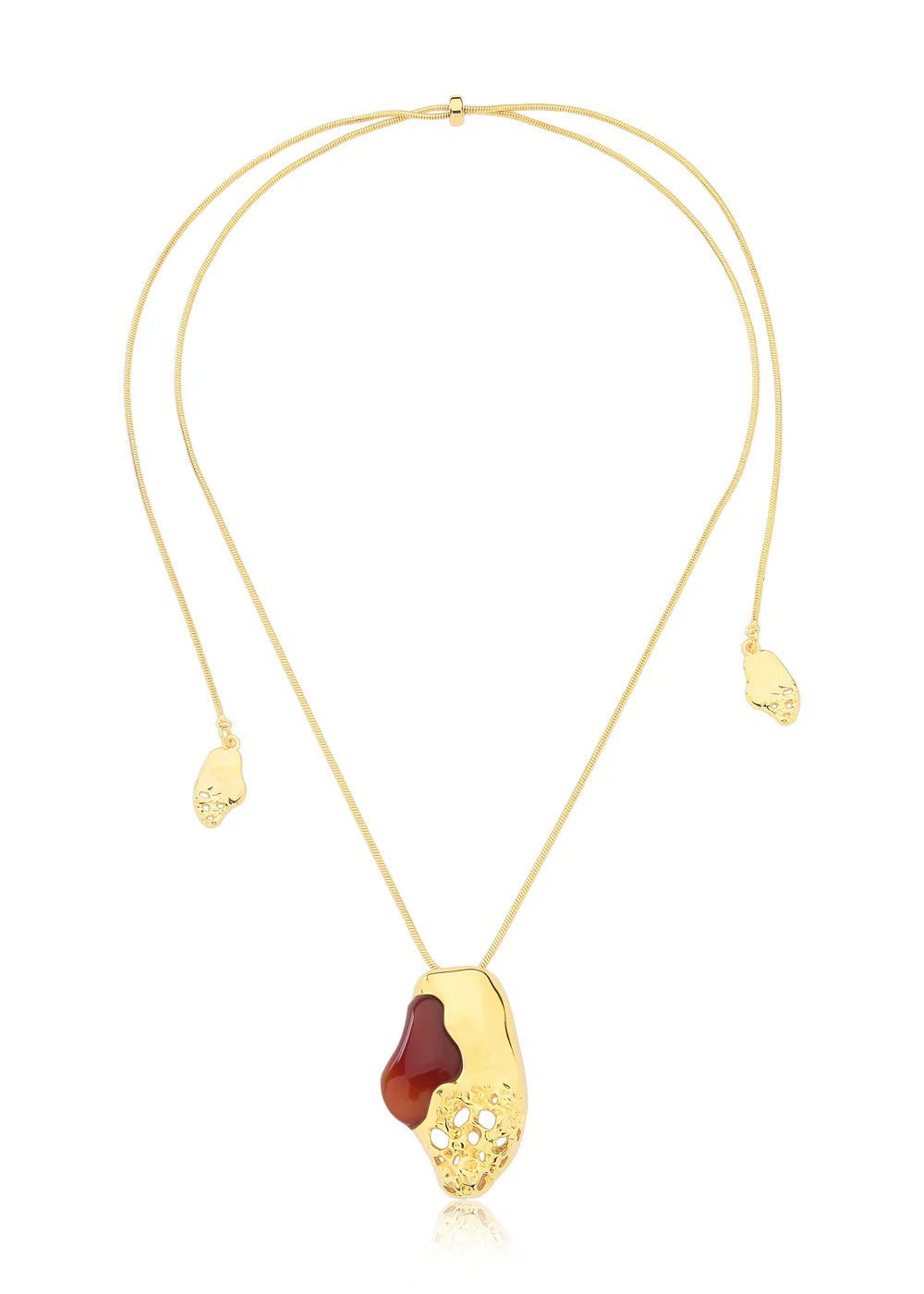 Gold necklace with a unique pendant on a white background