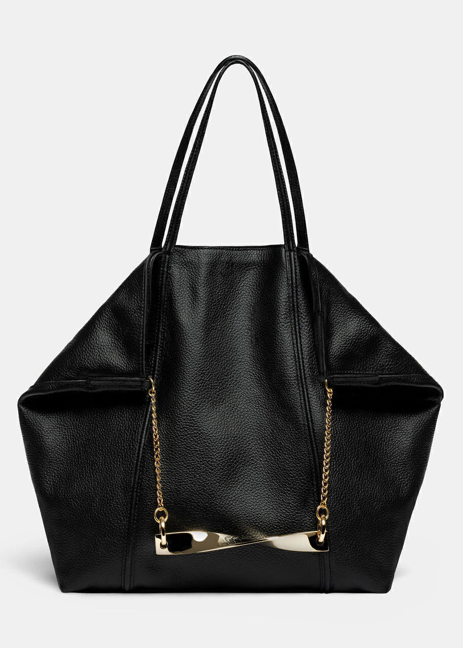 Black handbag with a gold chain on a light gray background