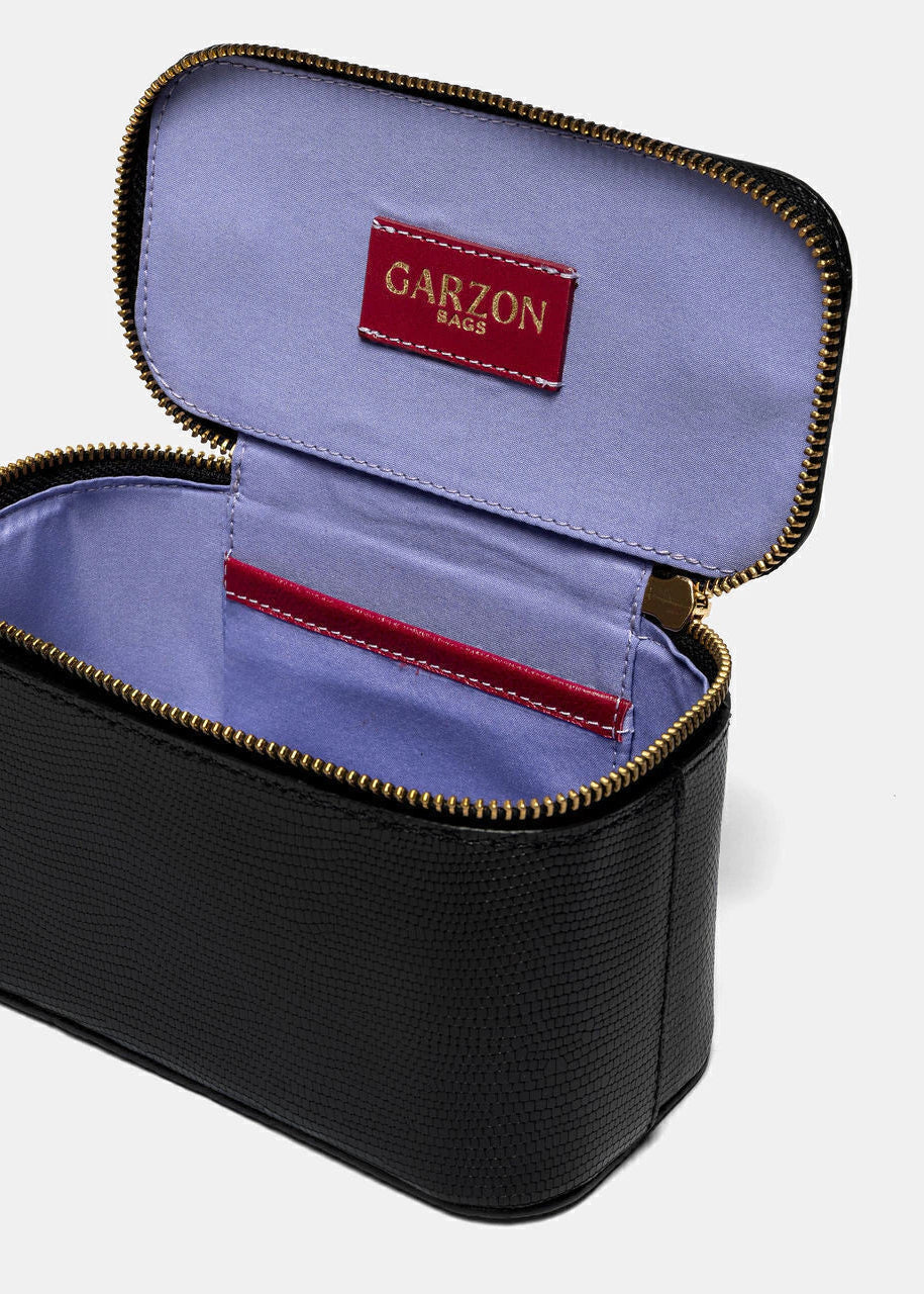 black petit square bag with purple interior 