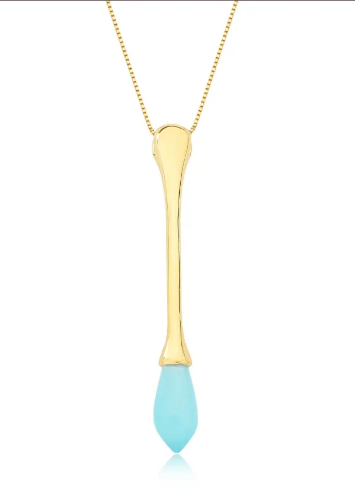 Gold necklace with a turquoise pendant on a white background