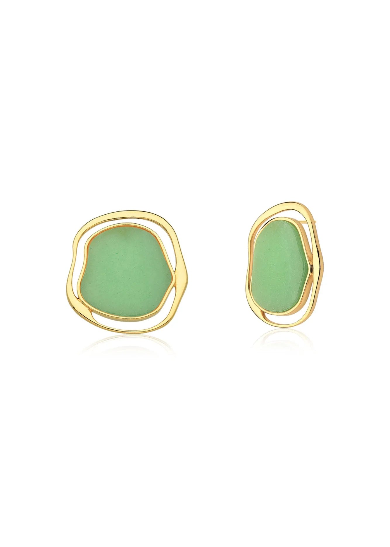 A pair of gold-toned stud earrings with organic, wavy outlines and smooth light green centers, displayed on a clean white background.