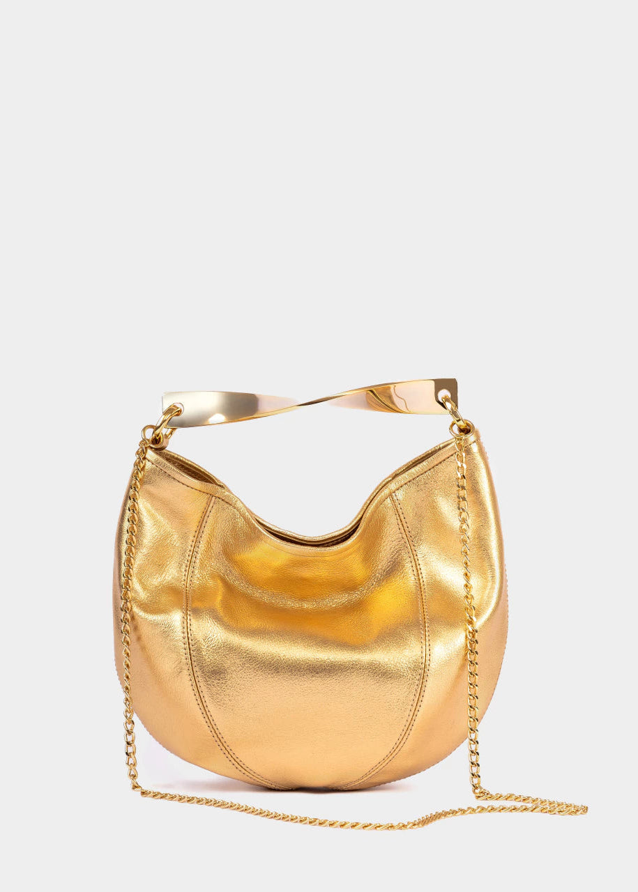 Gold handbag with chain detail on a white background