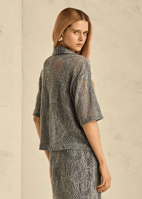Woman wearing a patterned outfit 
