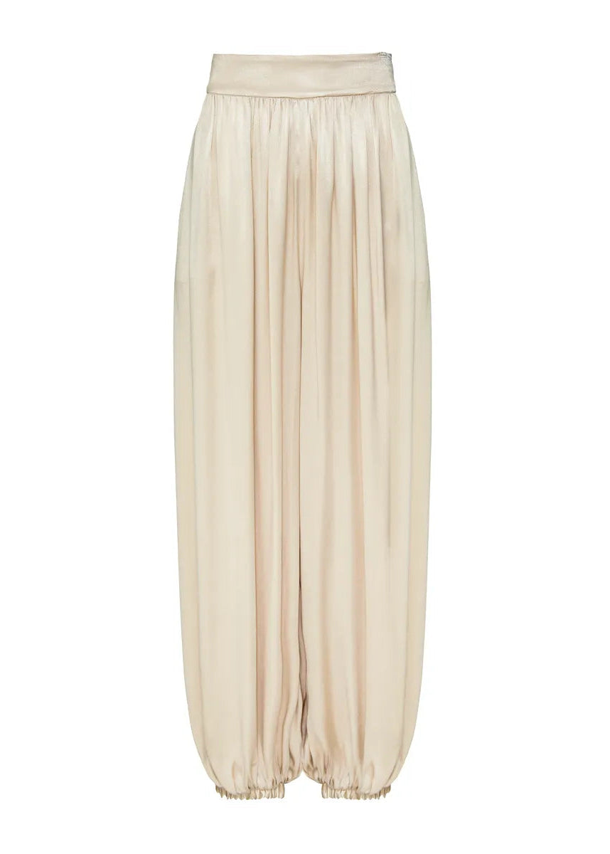 Beige wide-leg pants on a white background