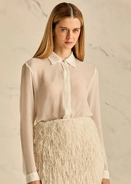 white sheer shirt with long sleeves